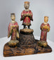 Late Qing Dynasty Chinese devotional carving with three painted figures arranged on an architectural base