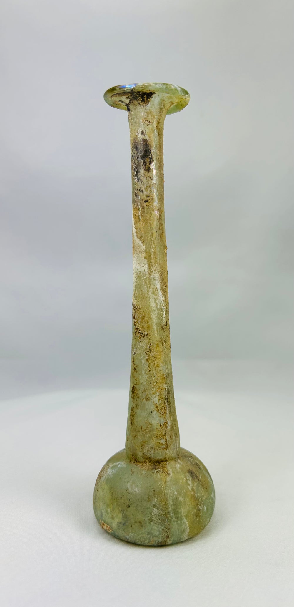 Roman Empire turquoise-toned glass perfume flask with slender tubular neck