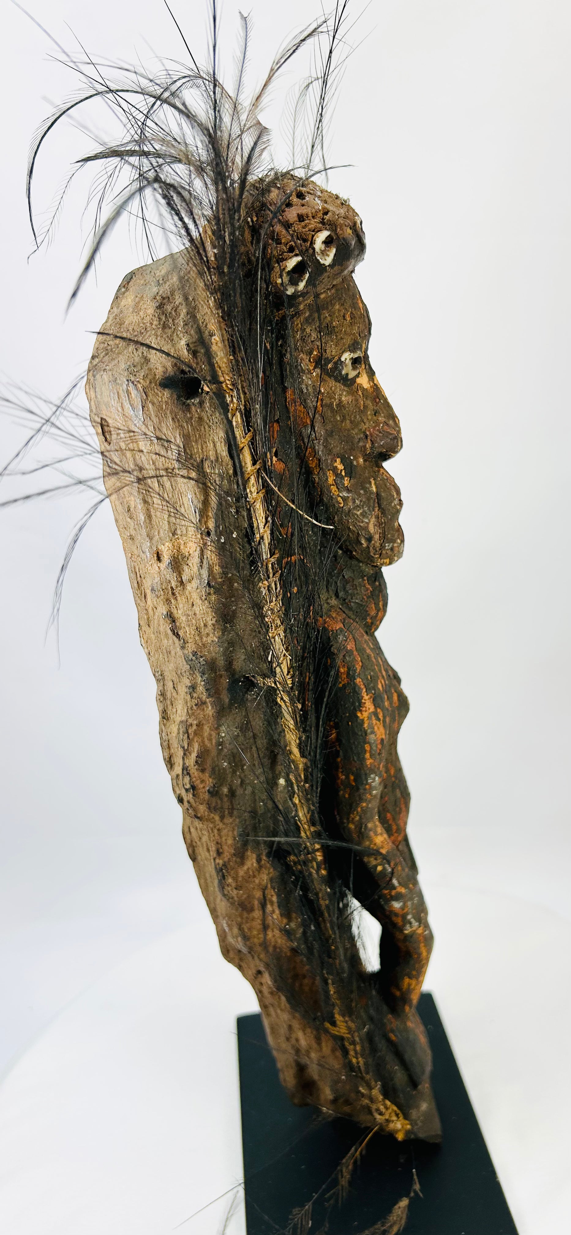 Historic Sepik River ceremonial figure showing ritual pigments and authentic patina