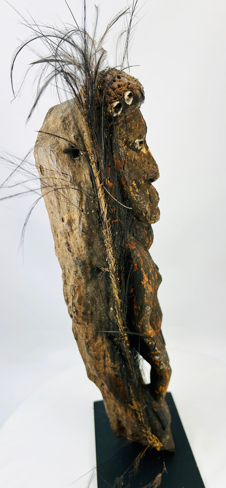 Historic Sepik River ceremonial figure showing ritual pigments and authentic patina