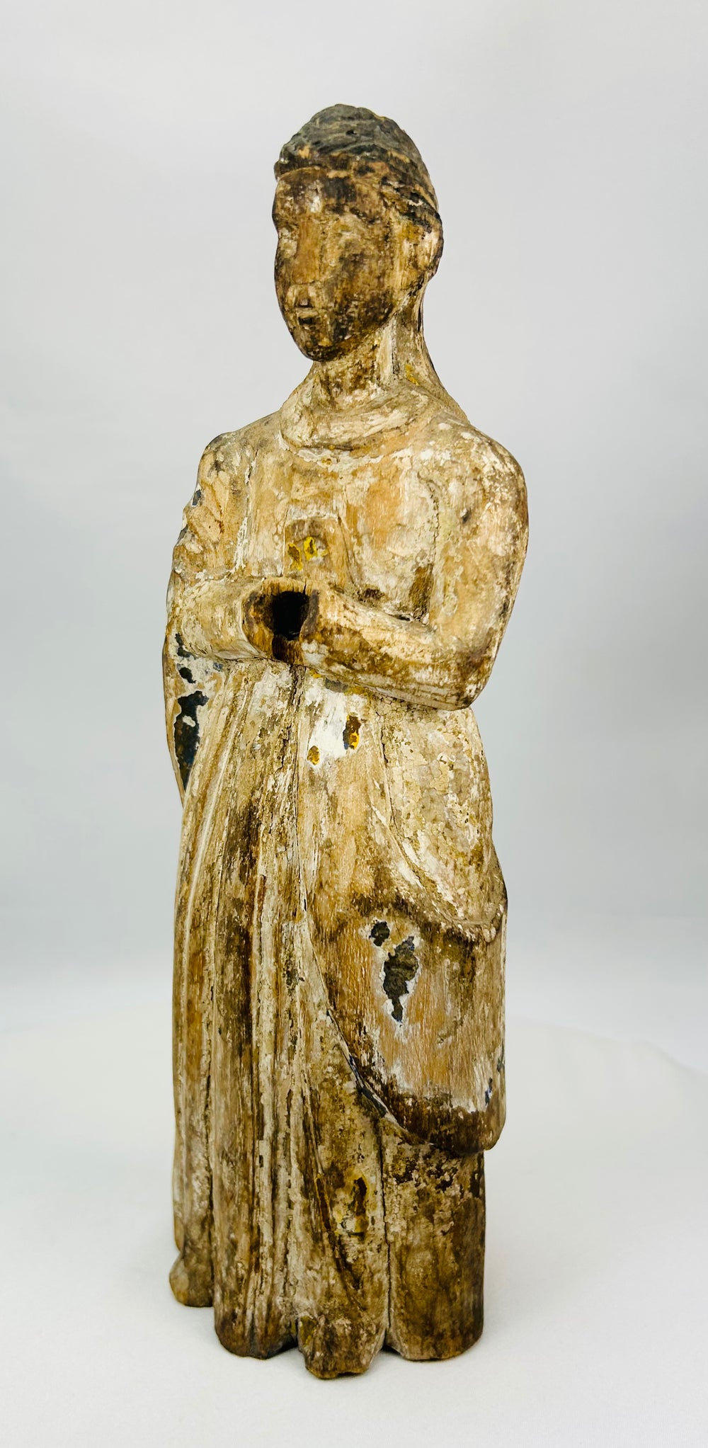 Hand-carved wooden Catholic Santos figure circa 1700s with spiritual presence
