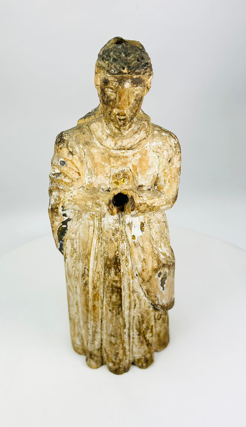 Spanish or Spanish Colonial carved wooden Santos relic symbolizing lived faith