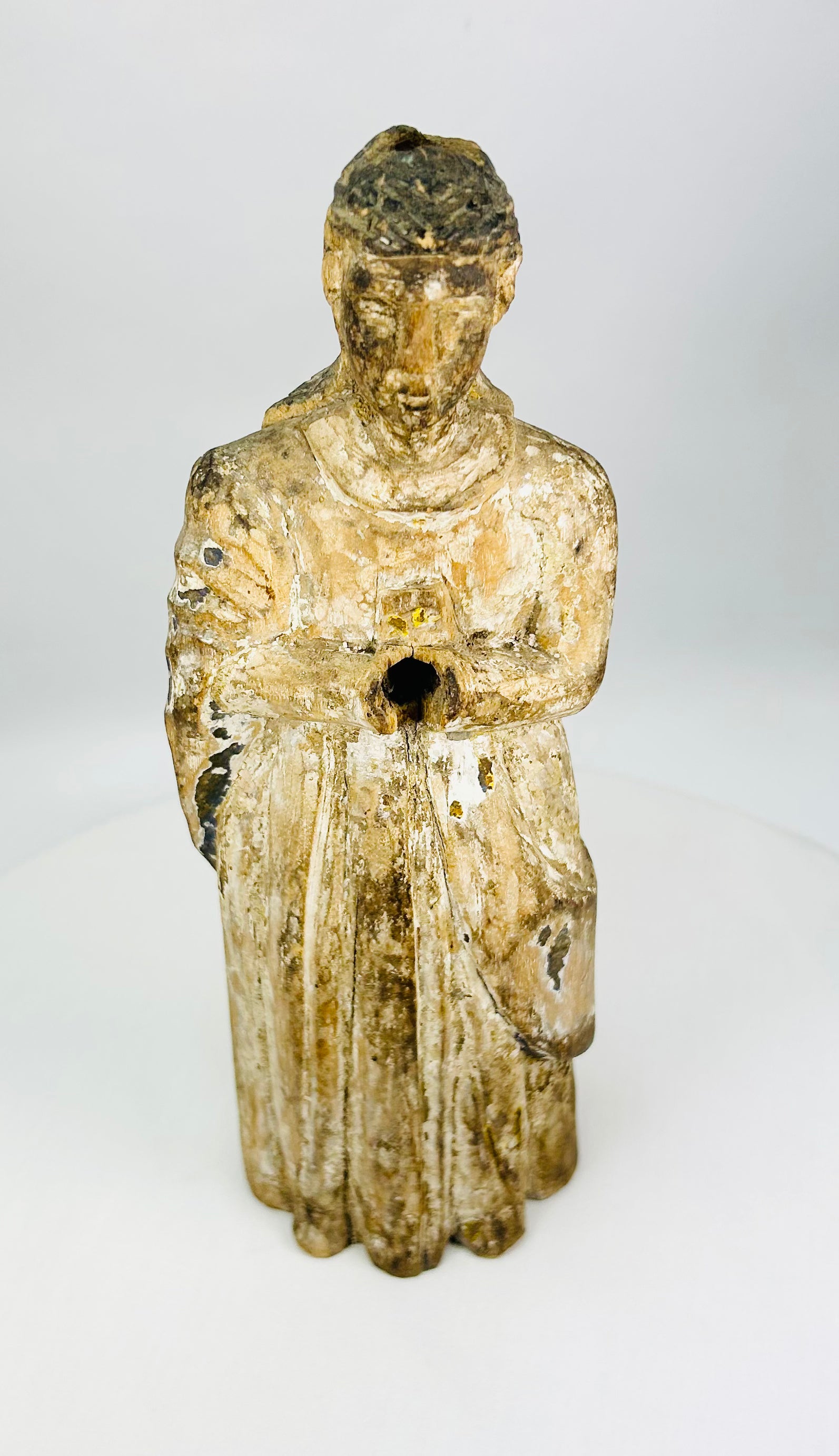 Spanish or Spanish Colonial carved wooden Santos relic symbolizing lived faith