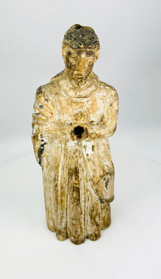 Spanish or Spanish Colonial carved wooden Santos relic symbolizing lived faith