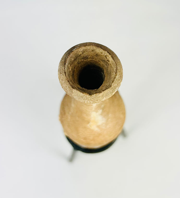 Historic Roman perfume vessel with elongated body, cylindrical neck, and naturally aged surface
