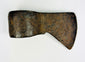 Early North American frontier iron axe head with worn working edge and patinated surface