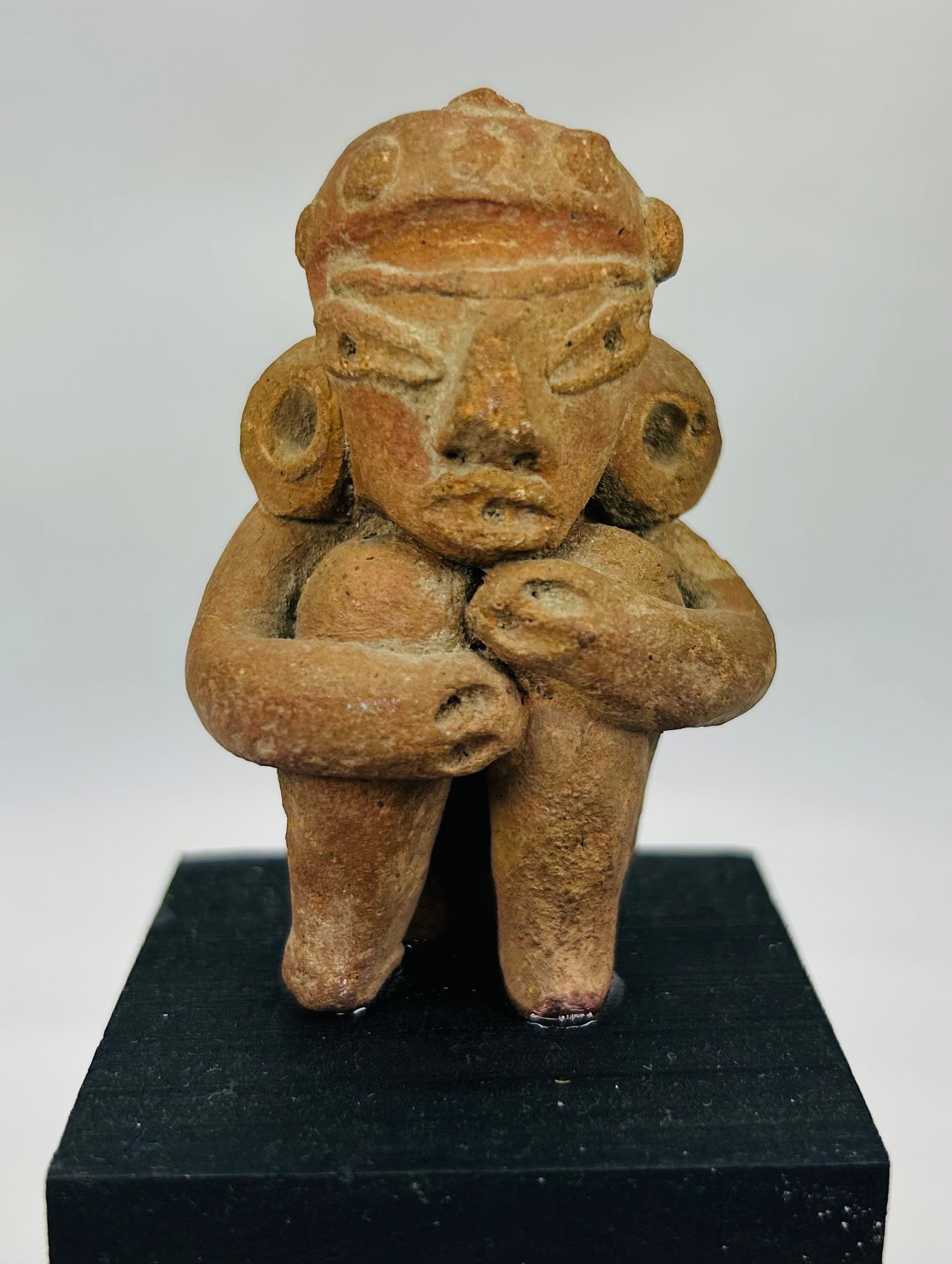 Museum-quality Pre-Columbian terracotta figure from West Mexico with emotional expression and burial context