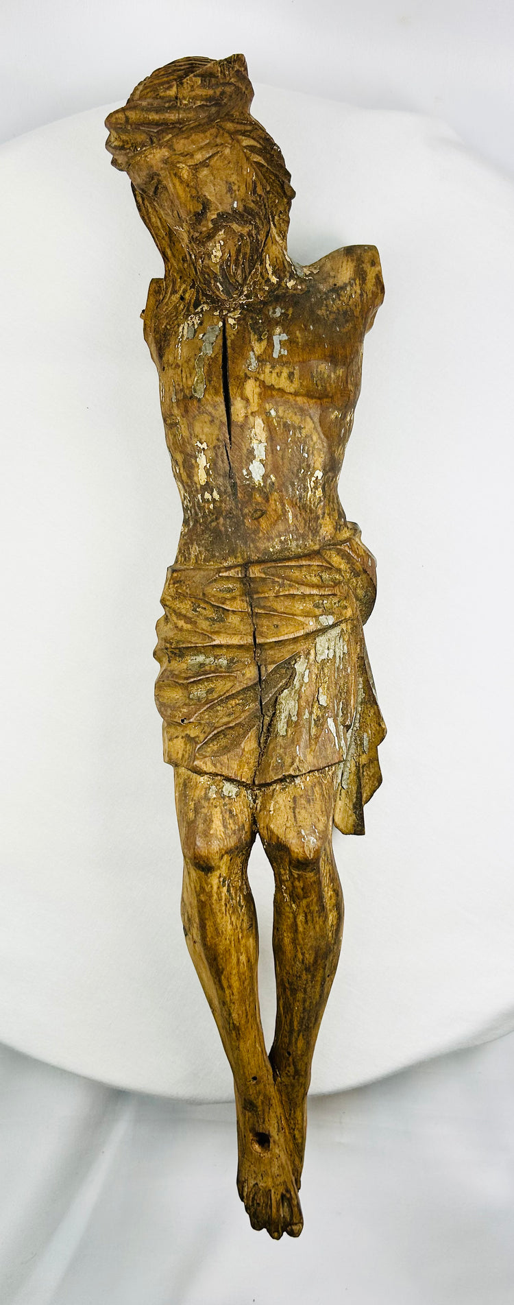 Antique Spanish Colonial Corpus Christi figure showing expressive facial carving and remnants of gilded paint