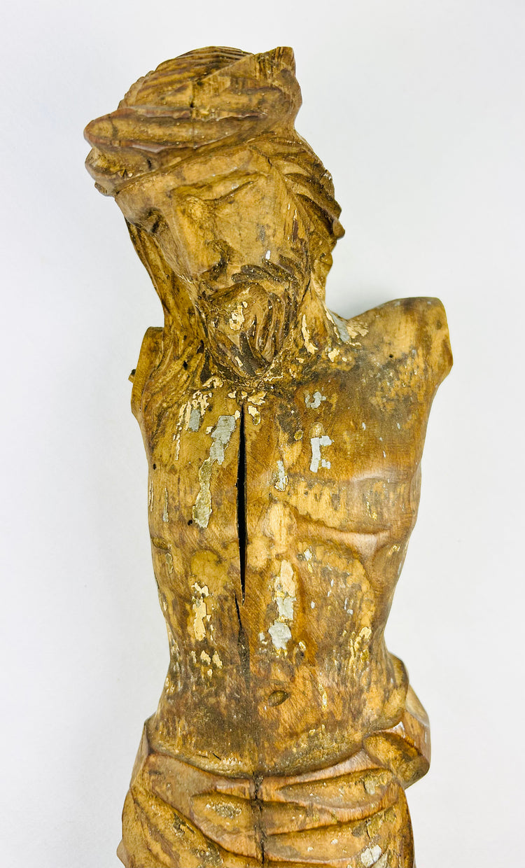 Historic 1600s Spanish Colonial religious sculpture with worn surface, patina, and missing arms from crucifix mounting