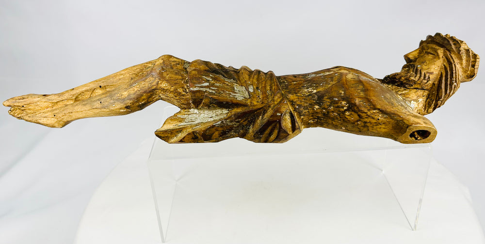 Spanish Colonial hardwood devotional sculpture featuring aged gilding, surface wear, and spiritual presence