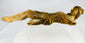 Spanish Colonial hardwood devotional sculpture featuring aged gilding, surface wear, and spiritual presence