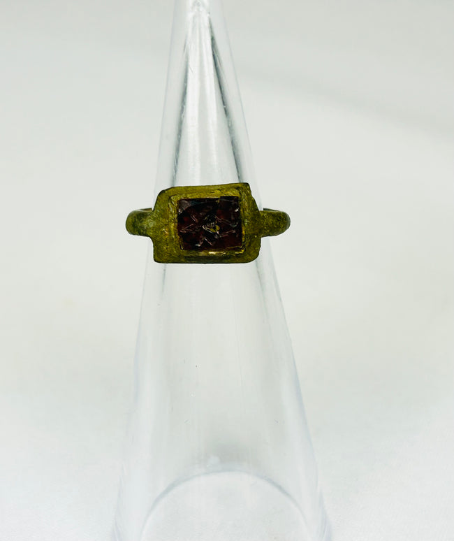 Ancient Roman bronze finger ring with symbolic carved intaglio and aged patina