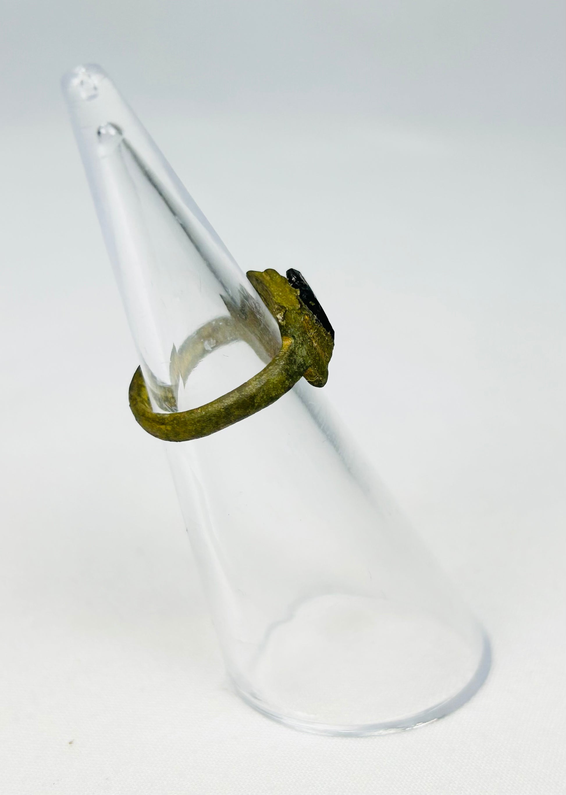 Ancient Roman jewelry artifact with symbolic red glass intaglio centerpiece