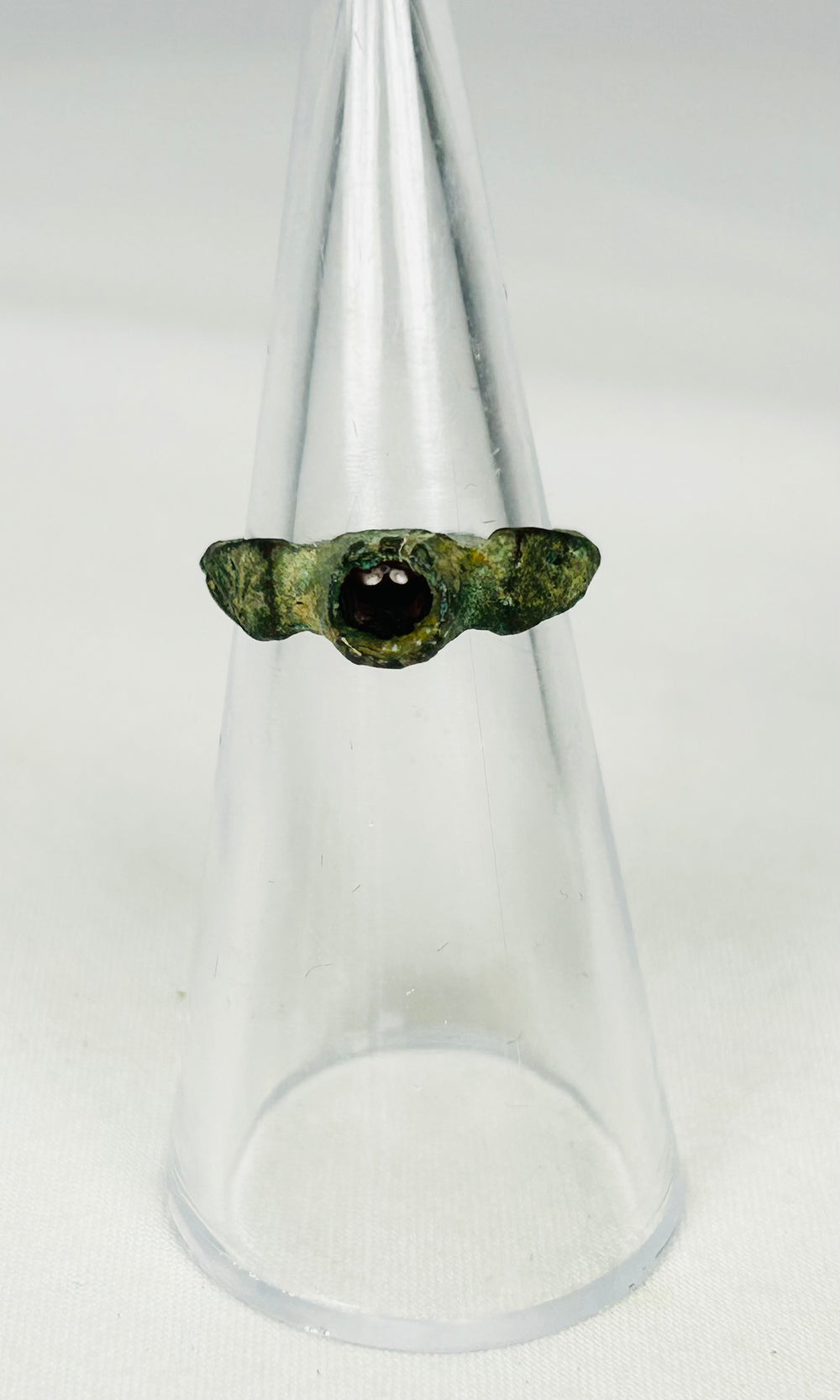 Authentic Roman Empire bronze finger ring with oval garnet stone centerpiece