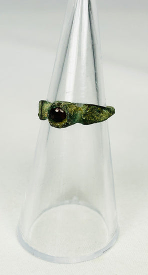 Side view of ancient Roman bronze ring highlighting bezel depth and gemstone setting