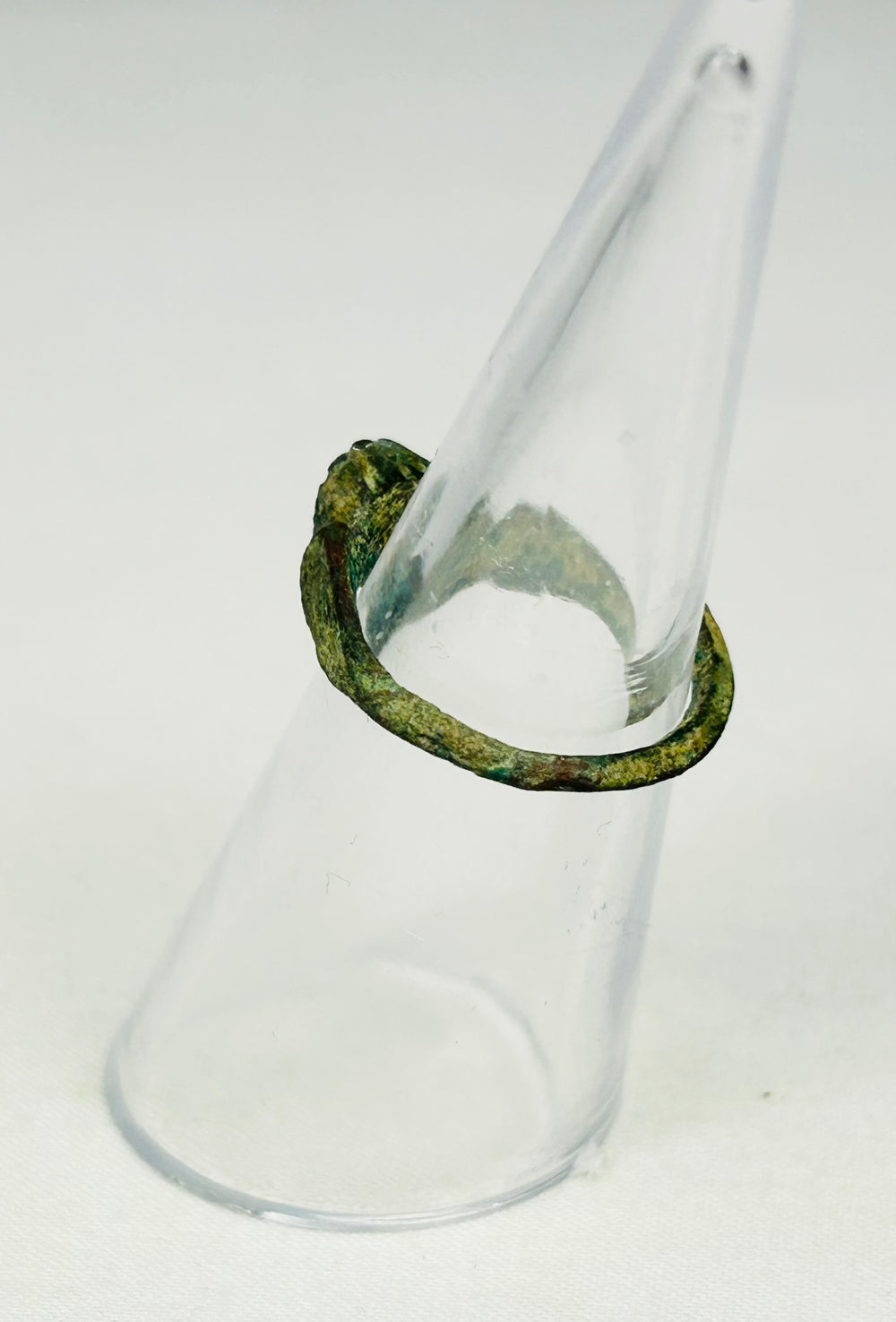 Rear view of 2nd-century Roman bronze ring showing sculpted shoulders and gemstone clarity