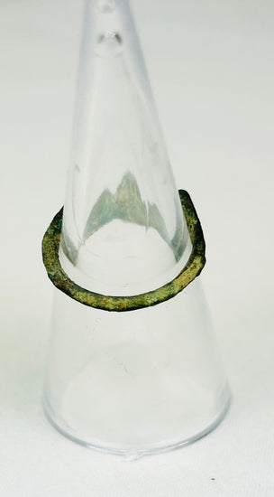 Back view of 2nd-century Roman bronze ring showing sculpted shoulders and gemstone clarity