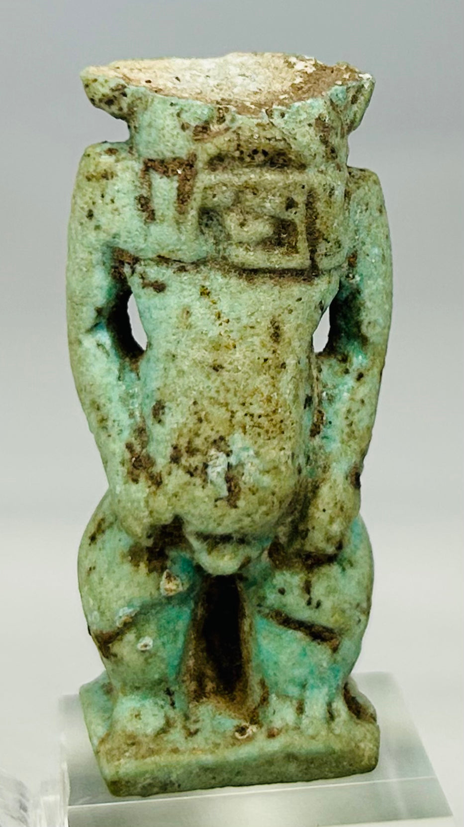 Cultural Egyptian faience amulet representing household protection and divine guardianship