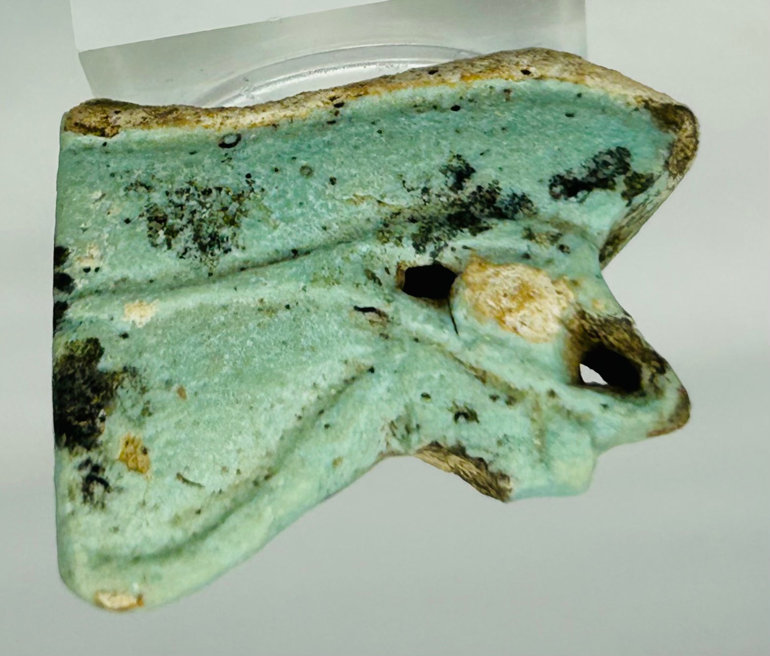 Museum-quality Egyptian faience eye protection amulet piece dating 664–332 BC