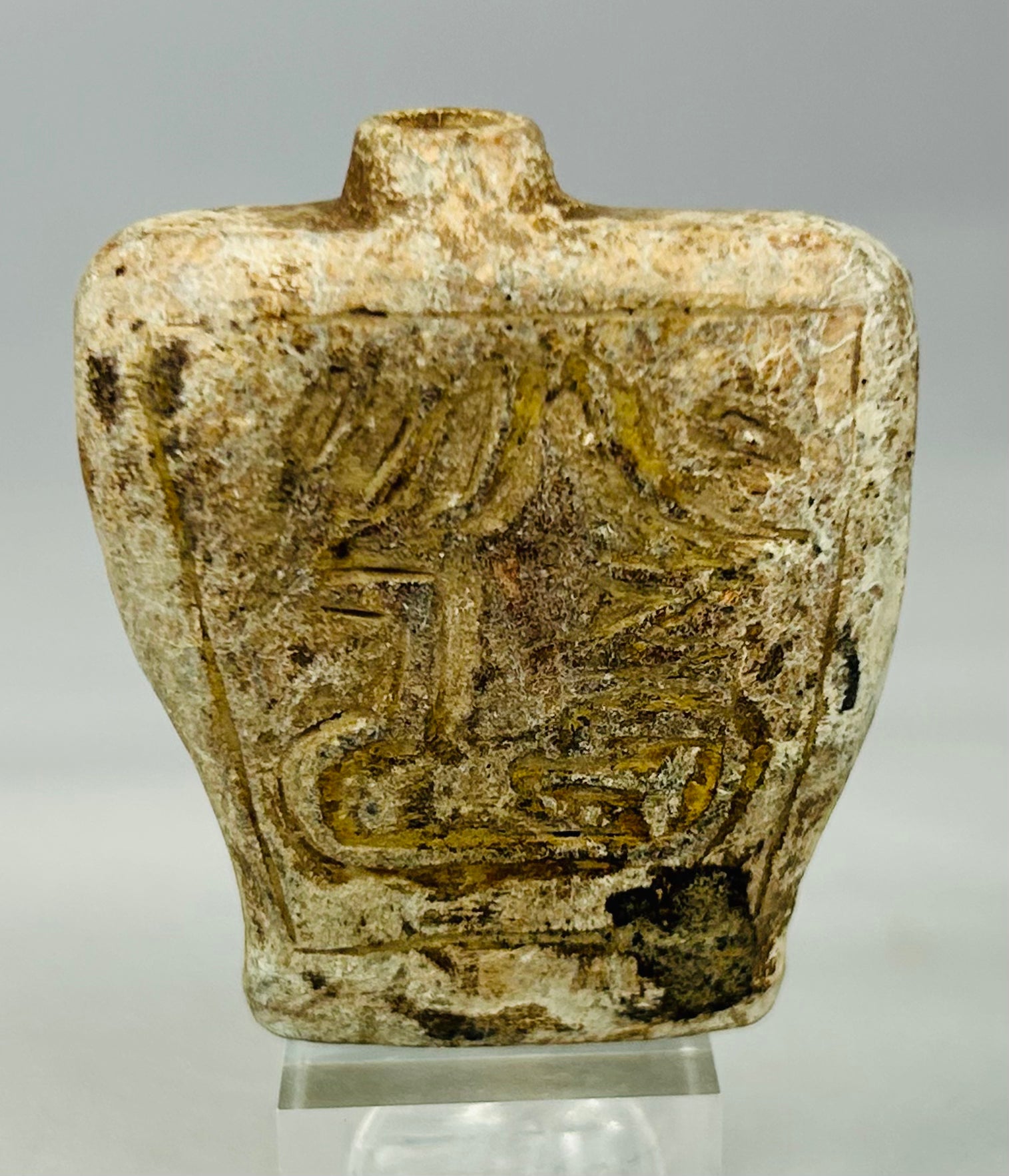 Authentic Near Eastern stone amulet flask with drilled neck and symbolic carvings