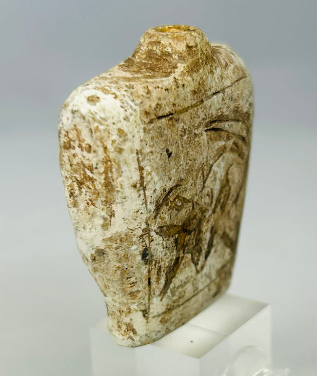 Ancient stone flask charm with drilled suspension neck and encrusted patina