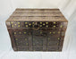 Antique Spanish or Portuguese iron-bound strong chest with riveted strapwork, brass details, and original painted interior traces