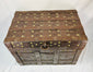 1840-dated Iberian strongbox in Renaissance style with heavy iron construction, brass studs, and robust security design