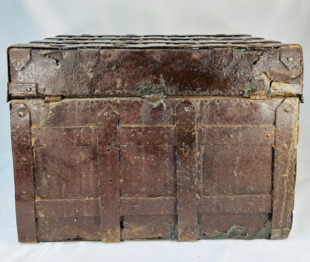 Museum-quality Iberian iron-bound strong chest showing oxidation, pitting, repairs, and beautifully preserved structural form