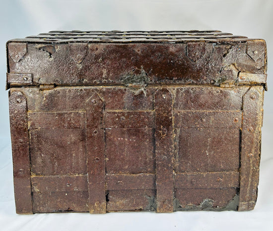 Museum-quality Iberian iron-bound strong chest showing oxidation, pitting, repairs, and beautifully preserved structural form
