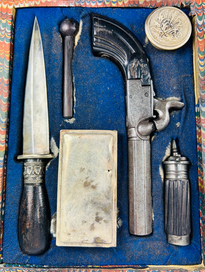 German-assembled traveling defense set featuring Belgian percussion pistol and stiletto dagger