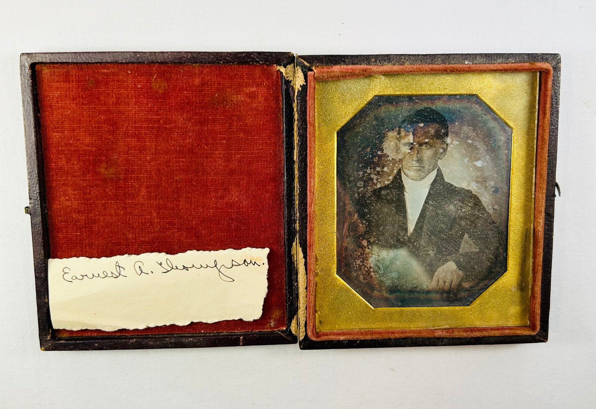 Military remembrance archive including medals, Bible relics, photographs, and naval history