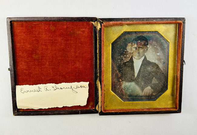 Military remembrance archive including medals, Bible relics, photographs, and naval history