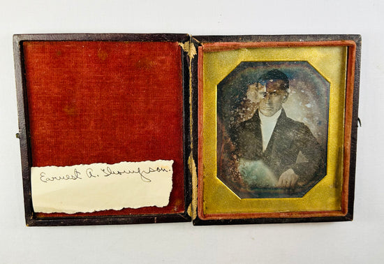 Military remembrance archive including medals, Bible relics, photographs, and naval history