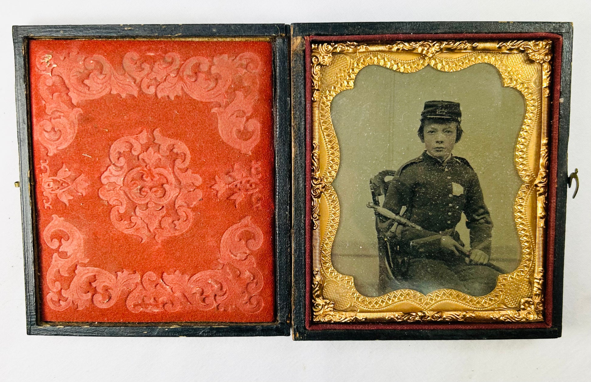 Complete preserved wartime archive including epaulettes, medals, documents, and photos