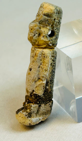 Ancient Egyptian devotional amulet with extensive glaze loss and authentic archaeological condition.