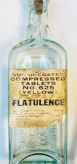 Sugar-coated flatulence remedy bottle with original vintage chemist label