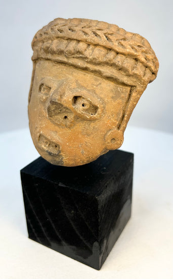 Pre-Columbian shaft tomb culture ceramic head fragment front view