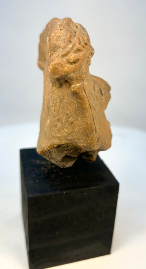 Historical Mesoamerican artifact terracotta head fragment close-up