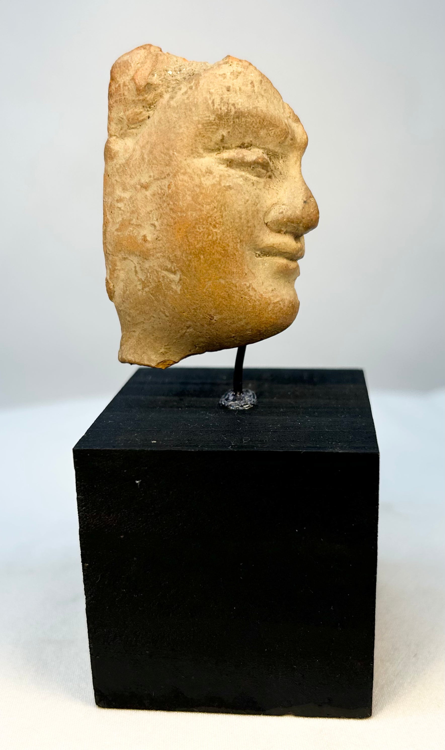 Ancient Greek or Roman terracotta head fragment with defined facial features
