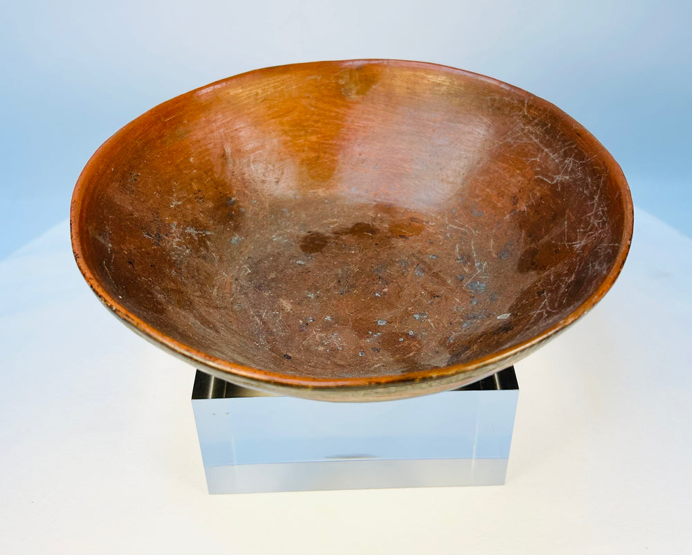 Close-up of Pre-Columbian geometric painted motifs on terracotta bowl