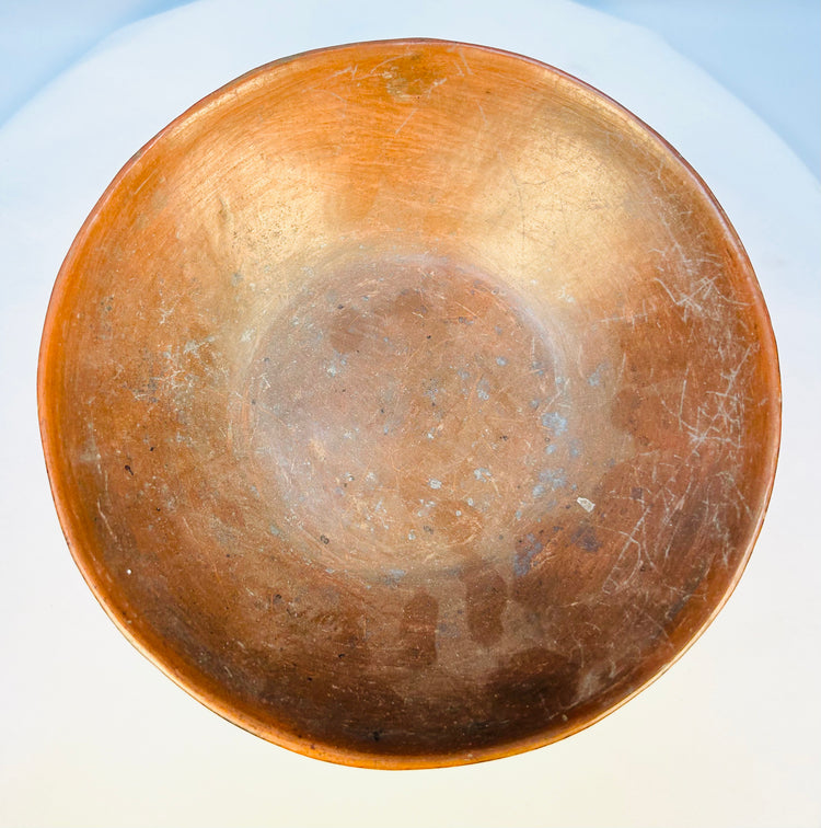 Historic Pre-Columbian ceramic bowl with swirling wave-like designs