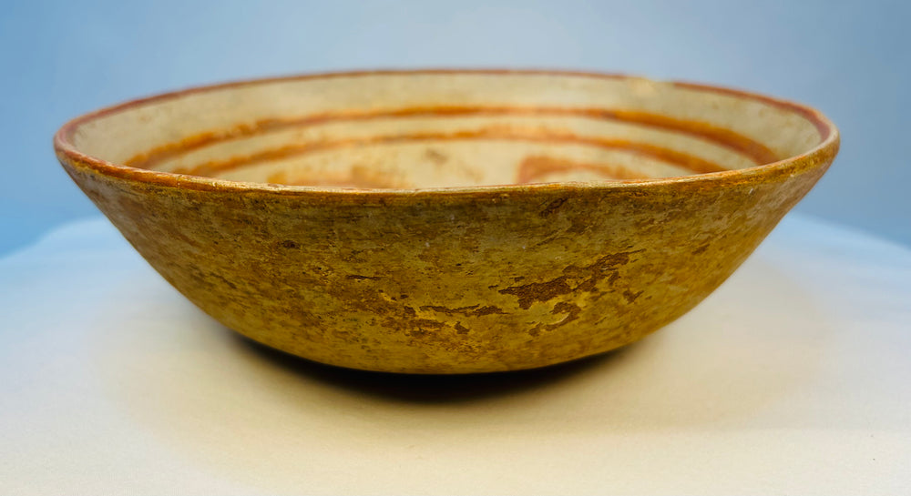 Museum-quality ancient terracotta bowl with hand-painted decorative bands