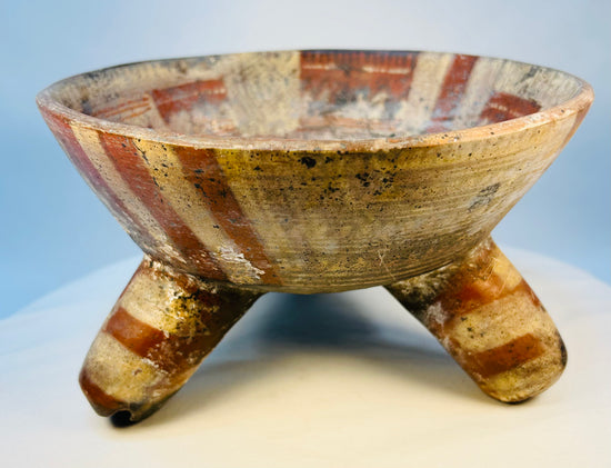 Ancient Mesoamerican terracotta tripod bowl with hollow rattle legs