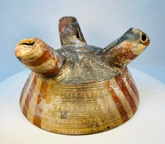 Pre-Columbian tripod bowl photographed from above showing interior design