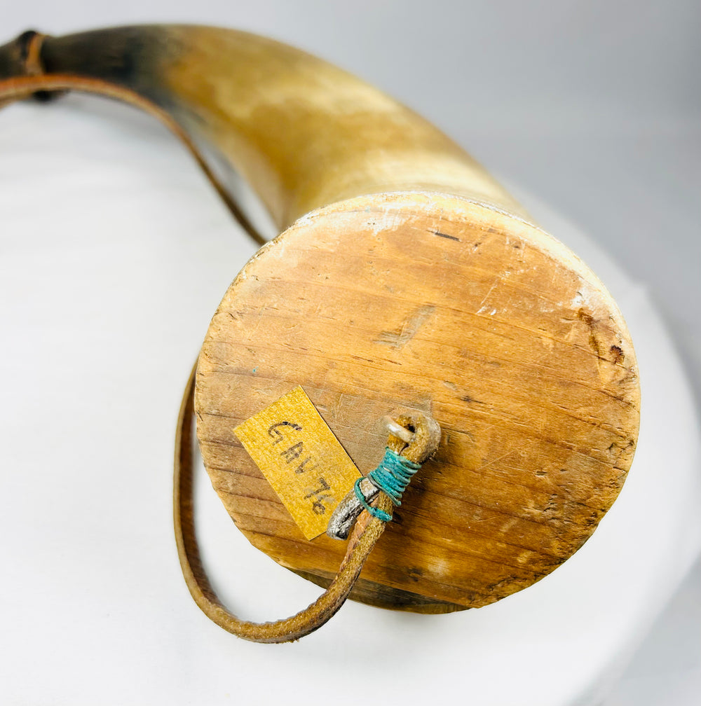 Well-preserved 19th-century horn powder container showing beautiful patina and historical character
