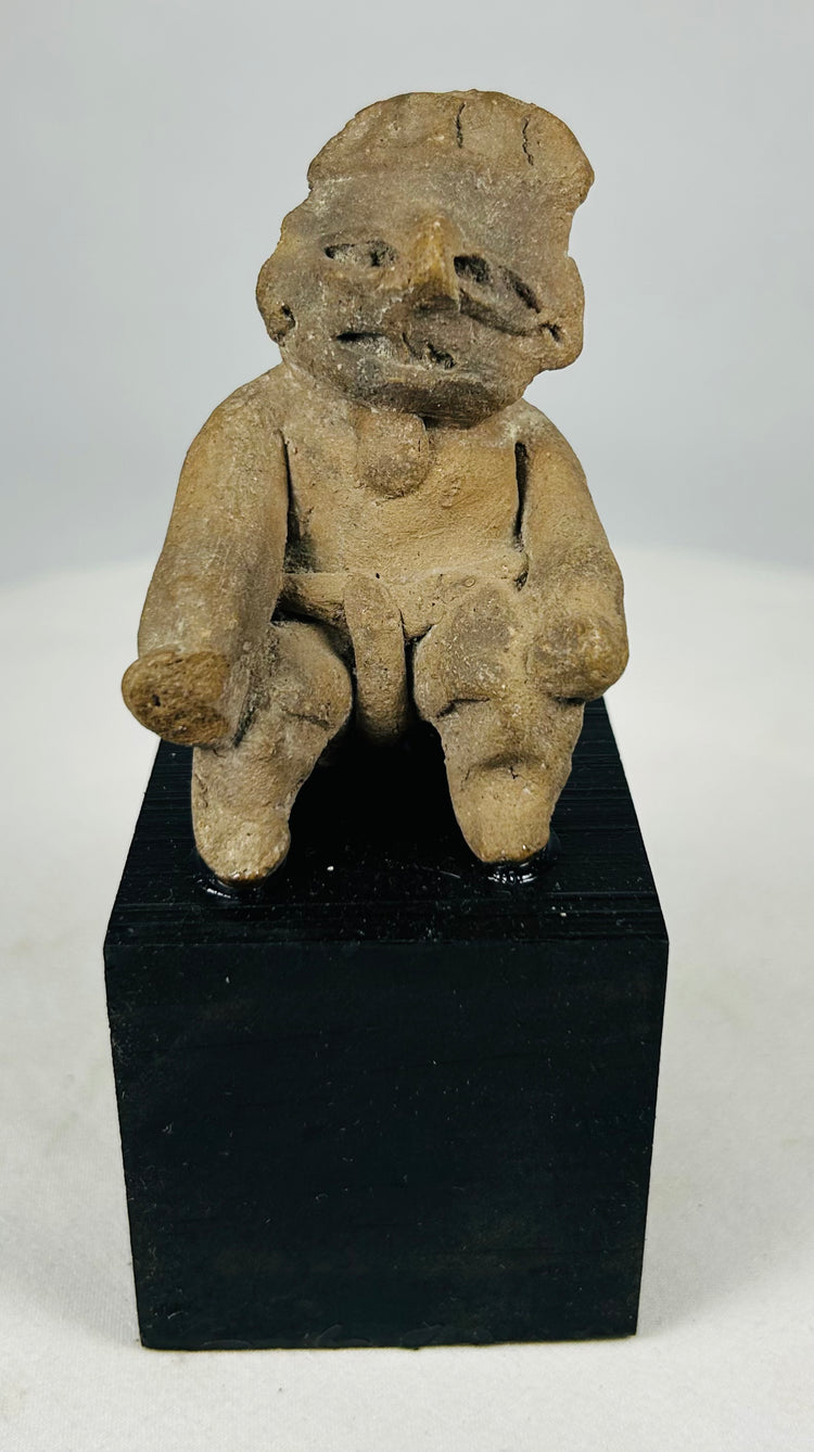 Authentic West Mexican shaft-tomb terracotta anthropomorphic figure displaying ritual posture and ancient patina