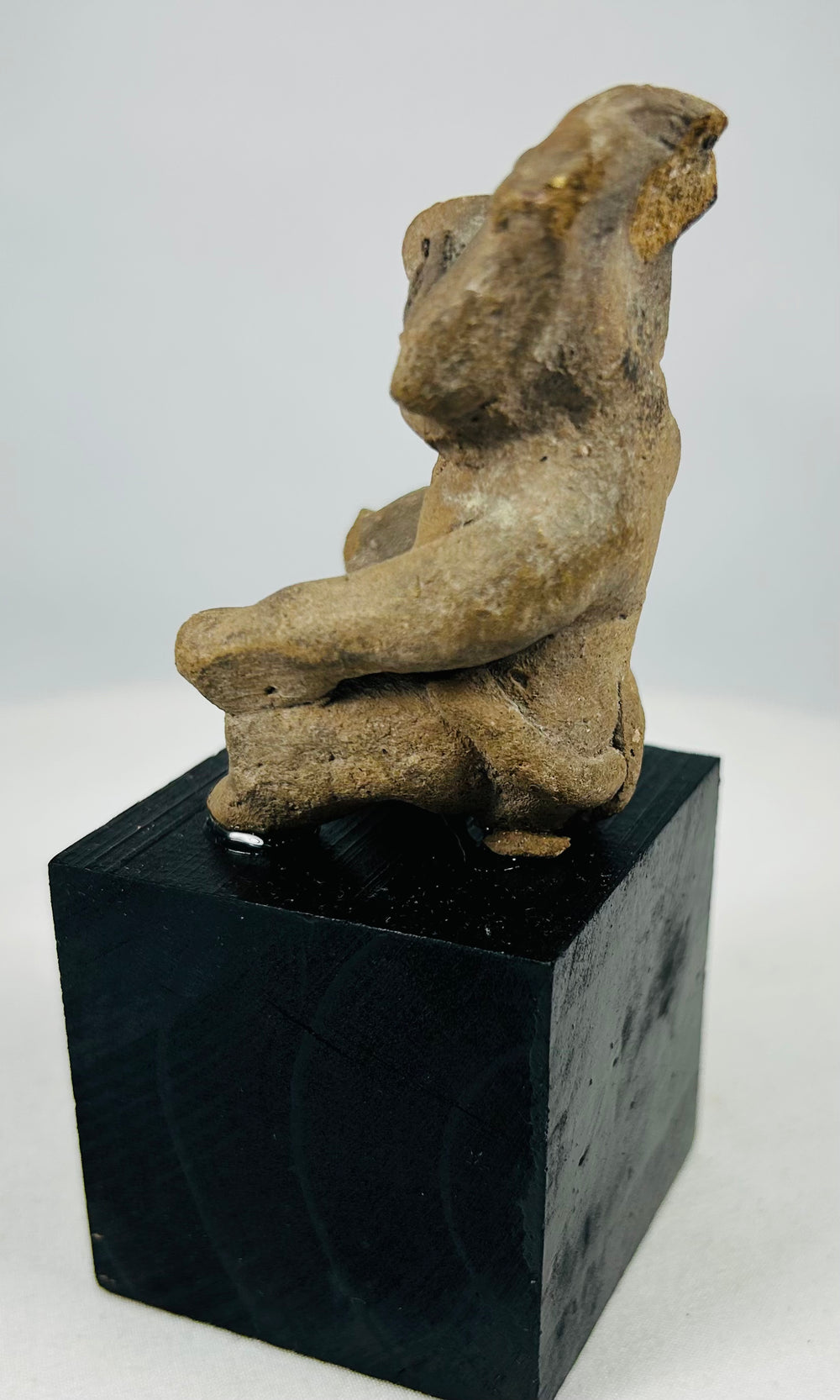 Museum-quality Pre-Columbian seated terracotta figure from West Mexico with bold sculptural form and expressive face
