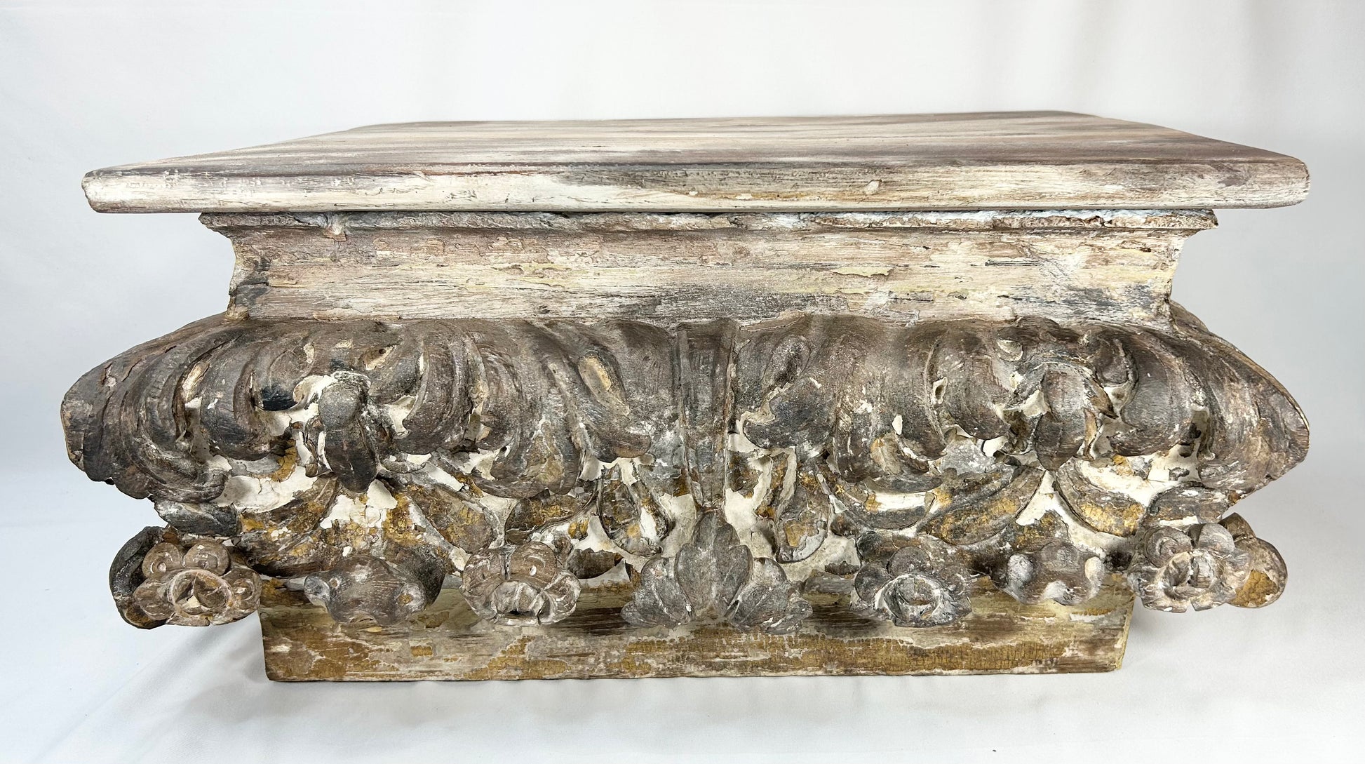 Historic architectural salvage piece with floral and foliate carving, later adapted as stand