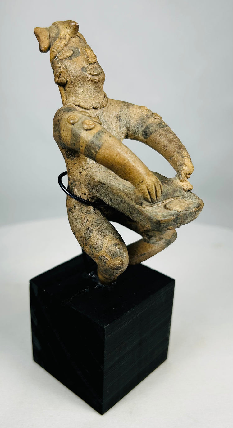 Antique terracotta West Mexican funerary figure mounted for display