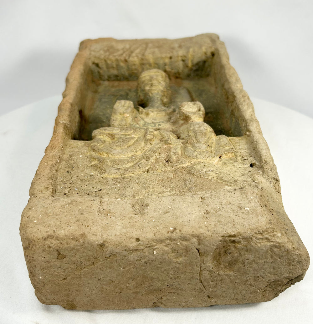 Chinese Northern Wei architectural fragment with Buddha carving